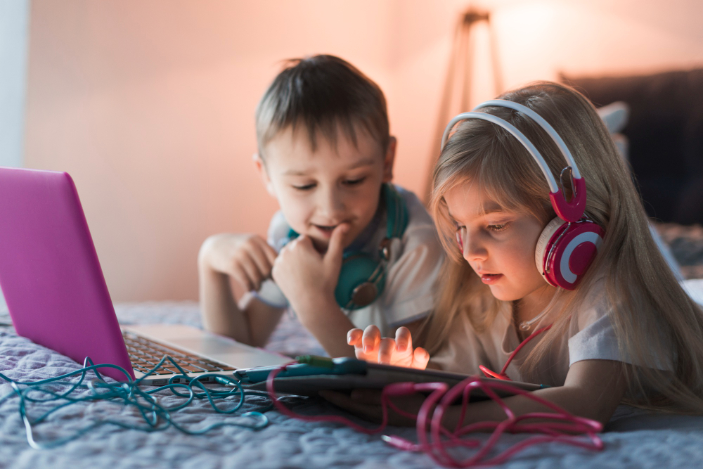 Two Kids with Laptop and Tablet